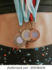 Young Gymnast With Many Medals