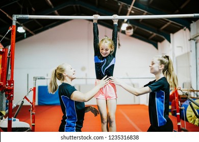 Young Gymnast On A Horizontal Bar