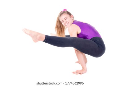 young gymnast posing isolated in white