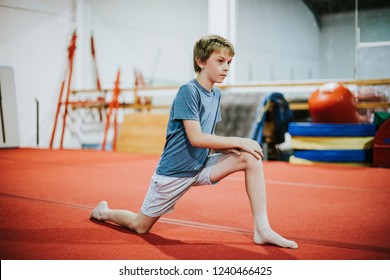 Young gymnast stretching