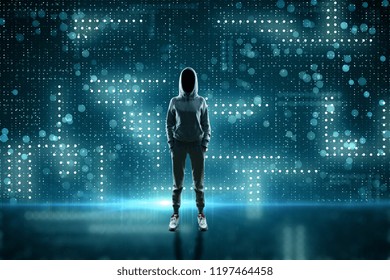 Young hacker in hoodie on abstract blurry circuit background. Criminal and computing concept.