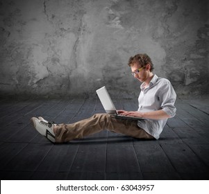 Young Hacker Using A Laptop