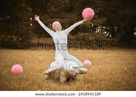 Similar – Young teenage girl blowing pink bubble gum