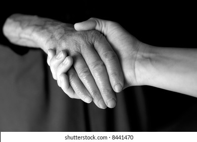 Young Hand Give Help To Old Hand