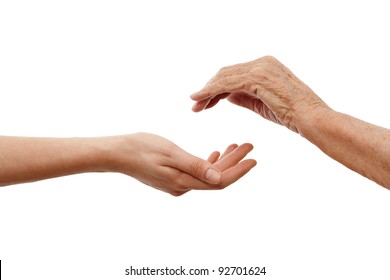 a young  hand holding an older one