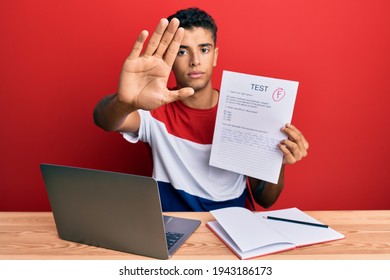 Young Handsome African American Man Showing Failed Exam With Open Hand Doing Stop Sign With Serious And Confident Expression, Defense Gesture 