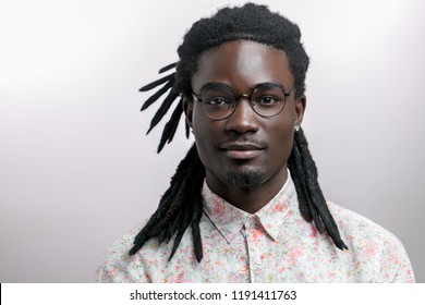 young handsome afro american man with dreadlocks isolated on white background - Powered by Shutterstock