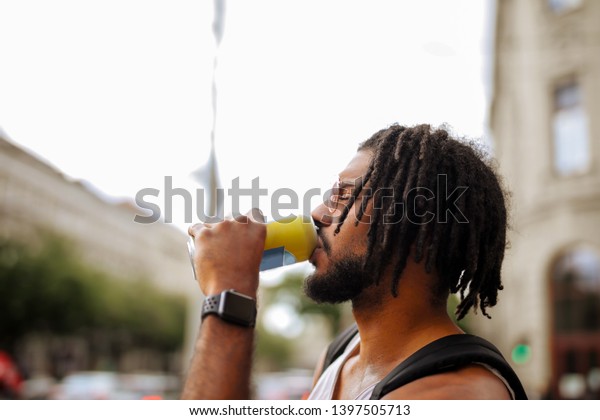 Young Handsome Afro Man Having Drink Stock Photo (Edit Now) 1397505713