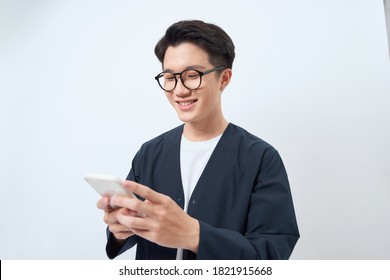 Young Handsome Asian Man Using Mobile Phone