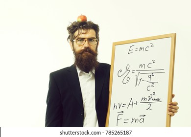 young handsome bearded man scientist or professor in glasses with long beard holding apple and teacher board with einstein formula and newtons law isolated on white background