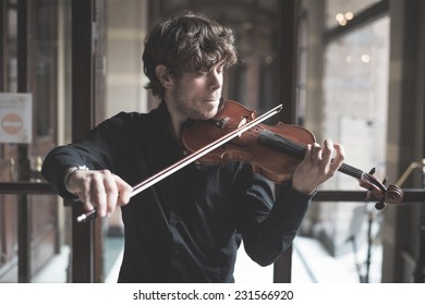 Young Handsome Blonde Italian Violinist