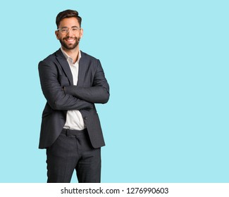 Young Handsome Business Man Crossing Arms, Smiling And Relaxed