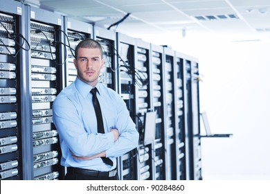 Young Handsome Business Man  Engeneer In Datacenter Server Room