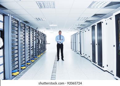 Young Handsome Business Man  Engeneer In Datacenter Server Room