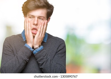 Young handsome elegant man over isolated background Tired hands covering face, depression and sadness, upset and irritated for problem - Shutterstock ID 1305890767