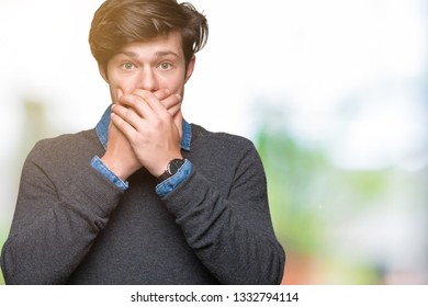 Young handsome elegant man over isolated background shocked covering mouth with hands for mistake. Secret concept. - Shutterstock ID 1332794114