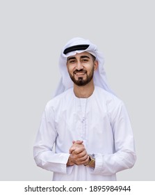 Young Handsome Emirati Business Man In UAE Traditional Outfit Showing A Variety Of Hand Gesture. Arabic Ambitious Mature Businessman.