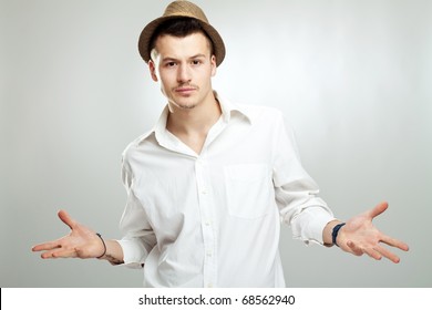 Young Handsome Fashion Man Wearing A Hat - Studio Shot