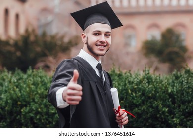 Senior Man Academic Regalia Holding Diploma Stock Photo 1238555434 ...