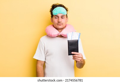 Young Handsome Guy Feeling Sad, Upset Or Angry And Looking To The Side. Flight Passenger Concept