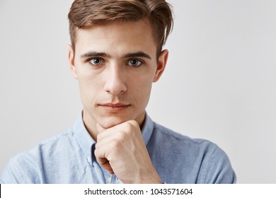 Young Handsome Guy Looks To The Camera With Kind Eyes. Sister Wanted To Tell Him Something Privately. Girl Wants Him To Know First That She Is Getting Married. Parents Do Not Know Yet