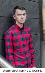 Young Handsome Guy In A Red Checkered Shirt