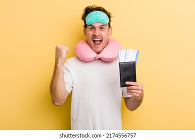 Young Handsome Guy Shouting Aggressively With An Angry Expression. Flight Passenger Concept