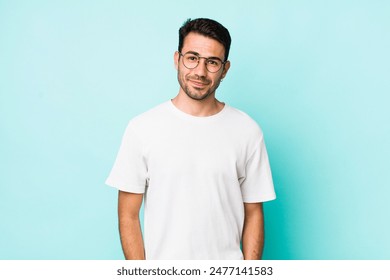 young handsome hicpanic man looking proud, confident, cool, cheeky and arrogant, smiling, feeling successful - Powered by Shutterstock