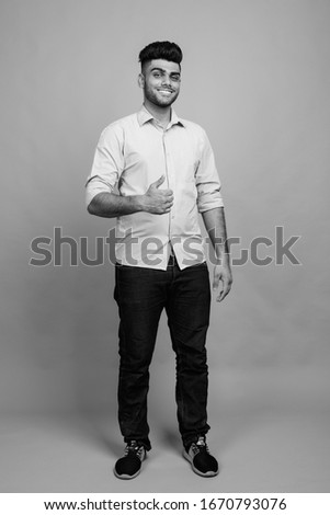 Similar – Image, Stock Photo young guy smiles and touches hair