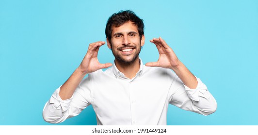 young handsome indian man happy expression - Shutterstock ID 1991449124