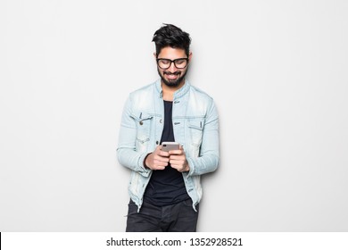 Young Handsome Indian Man Using Mobile Phone