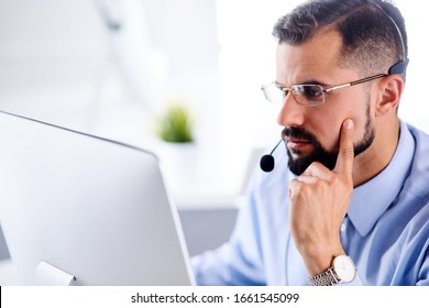 Young Handsome Male Technical Support Dispatcher In Call Center
