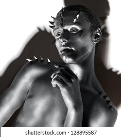 Young Handsome Man. Fantasy. Silver Body Art. Black & White Portrait