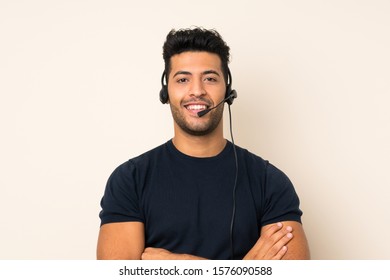 Young Handsome Man Over Isolated Background Working With Headset