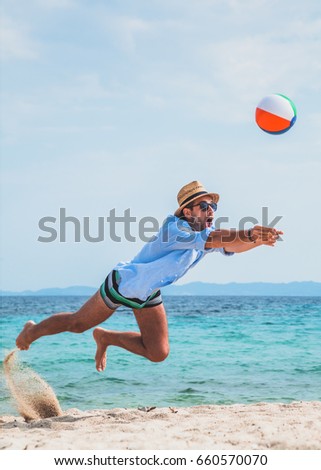 Similar – Summer holidays, man with snorkel and volley ball.