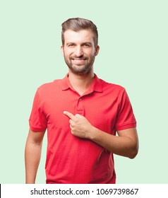 Young Handsome Man Pointing Himself Wearing Red Polo Shirt . Person Isolated Against Monochrome Background