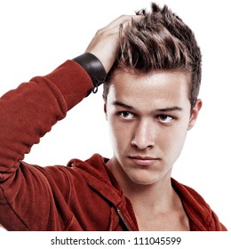 Young Handsome Man In Red Blouse Looking Aside