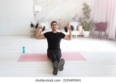 Young Handsome Man In Sportswear Do Exercises At Home. Healthy Lifestyle And Self Isolation Concept	