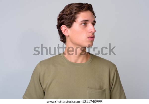 Young Handsome Man Wavy Hair Against Stock Photo Edit Now 1211740999