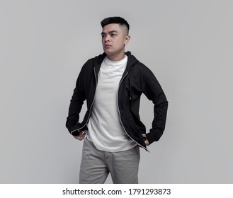 Young Handsome Man Wearing Black Zip Hoodie Isolated On Background Suitable For Mockup