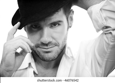 Young Handsome Man Wearing Black Hat.