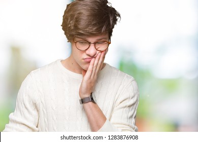 Young handsome man wearing glasses over isolated background thinking looking tired and bored with depression problems with crossed arms. - Shutterstock ID 1283876908