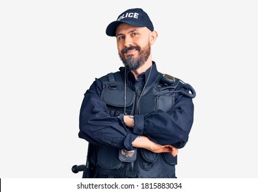 Young Handsome Man Wearing Police Uniform Happy Face Smiling With Crossed Arms Looking At The Camera. Positive Person. 