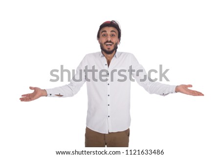 young handsome man wearing tarboosh and looking happy to camera while rising hands up , isolated in white background