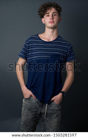 young handsome guy in denim shorts