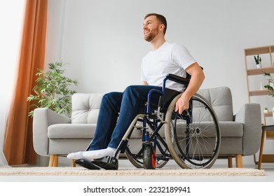 Young handsome man in wheelchair - Powered by Shutterstock