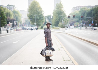 Young Handsome Millennial Black Man Outdoor Posing Looking Away Holding  Duffle Bag - Customer, Attitude Concept