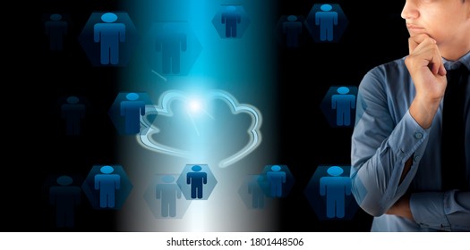 Young Handsome Salesman Or Seller In Blue Shirt And Black Necktie Isolated With Clouds And The Concept Of Cloud Computing, Digitalization, Digital Marketing, Selling, Teamwork, Connecting The World,.