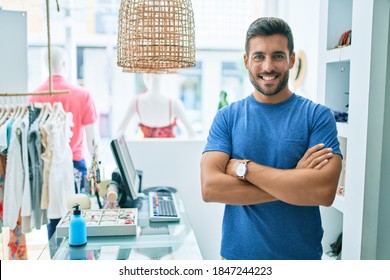 Young Handsome Shopkeeper Smiling Happy Standing At Clothing Store