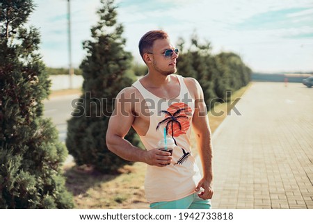 Similar – Close up of young man with sunglasses holding surfboard